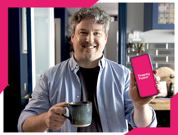 Man holding coffee along with PPP app open on his phone